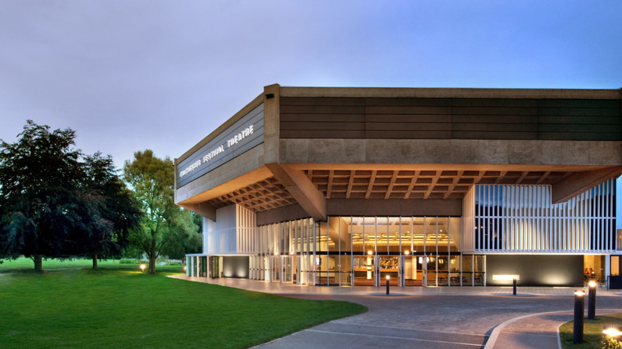 Exterior view of Chichester Festival Theatre at dusk